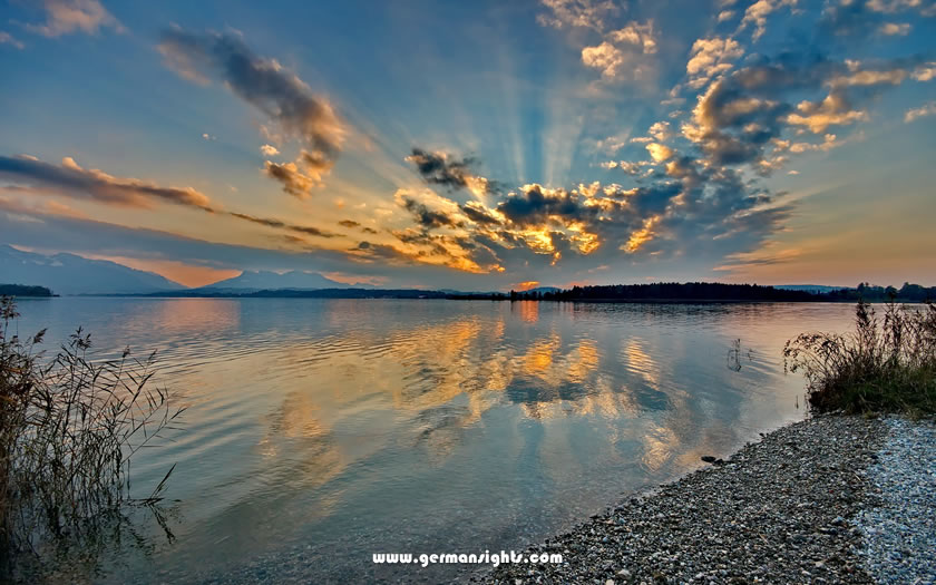 Yachts on the Chiemsee with the Alps in the background