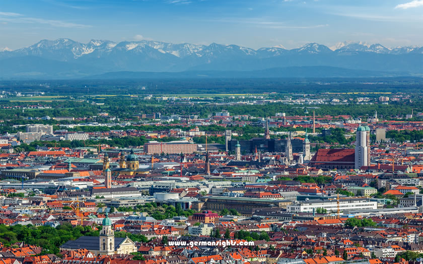 An aerial view of Munich city centre with the Bavarian Alps in the distance